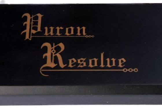 Black rectangular block from Puron called Resolve eliminates RFI problems