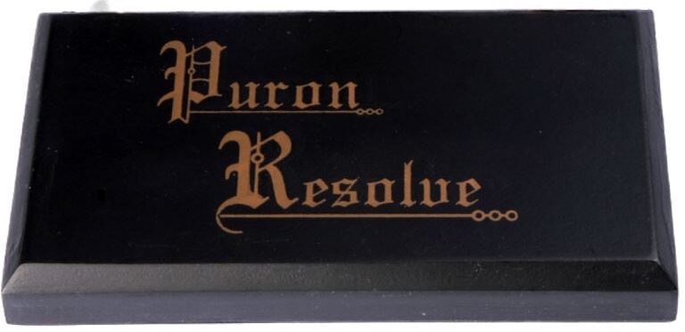 Black rectangular block from Puron called Resolve eliminates RFI problems